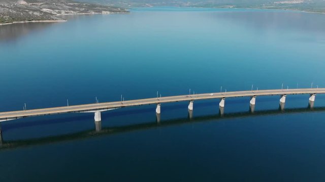 Techniti Limni Polifitou- Bridge over Polifitou Lake in Greece. Aerial-panning