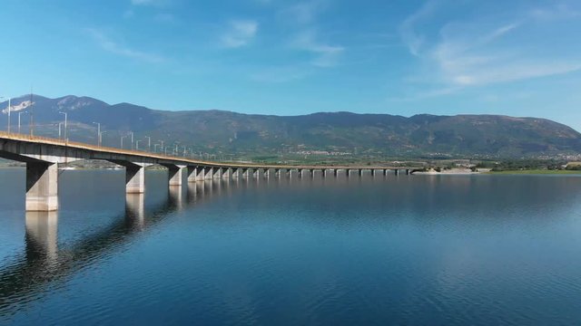 Techniti Limni Polifitou- Bridge over Polifitou Lake in Greece. Aerial- flying low.
