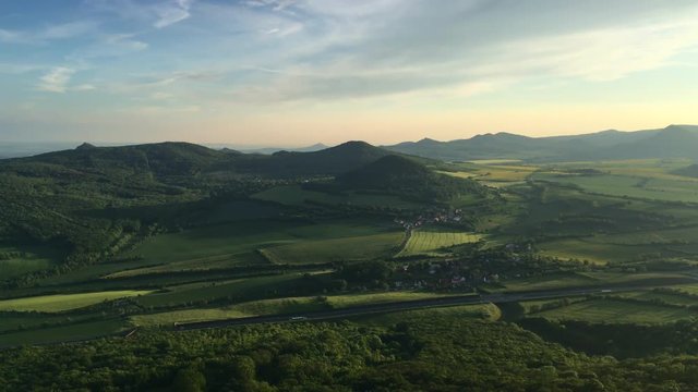 View from Lovos Hill. Sunset  in Central Bohemian Highlands, Czech Republic. Central Bohemian Uplands  is a mountain range located in northern Bohemia. The range is about 80 km long.