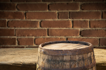 Fototapeta premium background of barrel and worn old table of wood