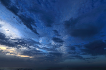 Naklejka na ściany i meble Blue morning skies decorated with lovely cloudscapes