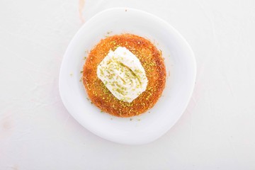 Turkish Künefe Dessert With Cream and Peanuts