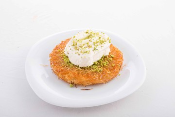Turkish Künefe Dessert With Cream and Peanuts