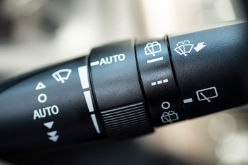 detail of a wiper lever of a car