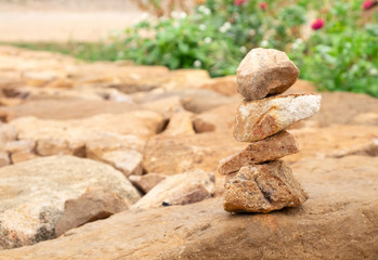 Stone stack on the rock sheet in the garden. for nature background.