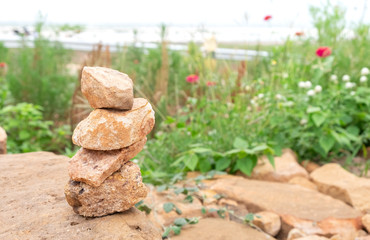 Stone stack on the rock sheet in the garden. for nature background.