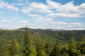 Fototapeta na wymiar springtime Beskid Slaski mountains from view tower on Stary Gron hill above Brenna village in Poland