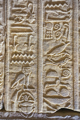 Vertical hieroglyphs in the Temple of Horus in Edfu