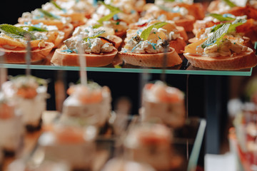 delicious festive buffet with canapes and different delicious meals