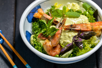 Chinese dish with shrimps and avacado paste