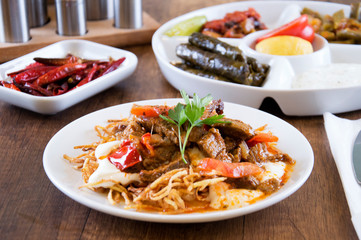 Turkish meat roasting and snacks on table