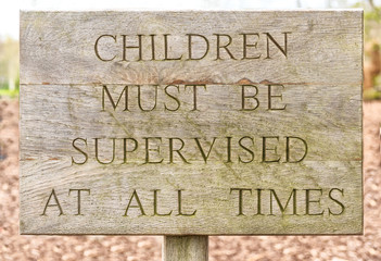 Wooden children must be supervised sign