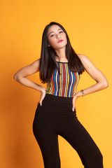 Obraz premium Portrait of beautiful young Asian woman in colorful shirt