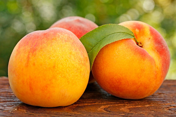 Fototapeta na wymiar Peaches in natural background.