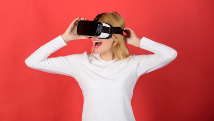Woman watching virtual reality vision. Woman with virtual reality headset. The woman with glasses of virtual reality. VR vision.