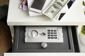 Small modern safe in cabinet drawer