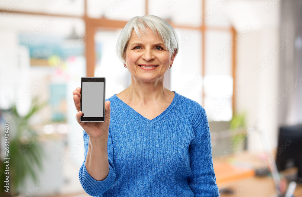 Canvas Prints technology and old people concept - smiling senior woman showing smartphone over office background