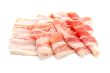 Raw bacon strips on white background