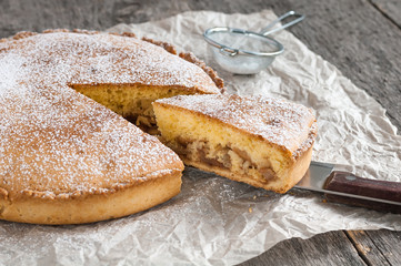 Homemade Apple Pie on wooden background. Classic autumn dessert