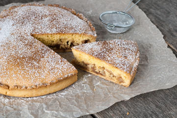 Homemade Apple Pie on wooden background. Classic autumn dessert