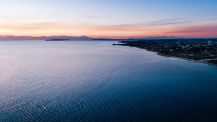 Fototapeta premium Aerial drone view of Sardinia bay at sunset