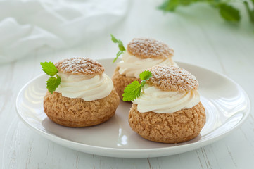 Choux Buns with Craquelin (crispy cream puffs) filled cream decorated
