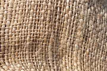 Partially view of a brown bag that was made of natural fibers.