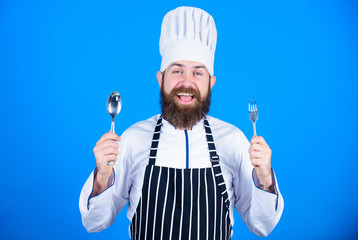Naklejka premium Future chef. Vegetarian. Mature chef with beard. Bearded man cook in kitchen, culinary. Dieting and organic food, vitamin. Chef man in hat. Secret taste recipe. Healthy food cooking