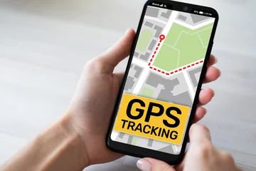 Selbstklebende Fototapeten GPS tracking map on smartphone screen. Global positioning system, navigation concept. © WrightStudio