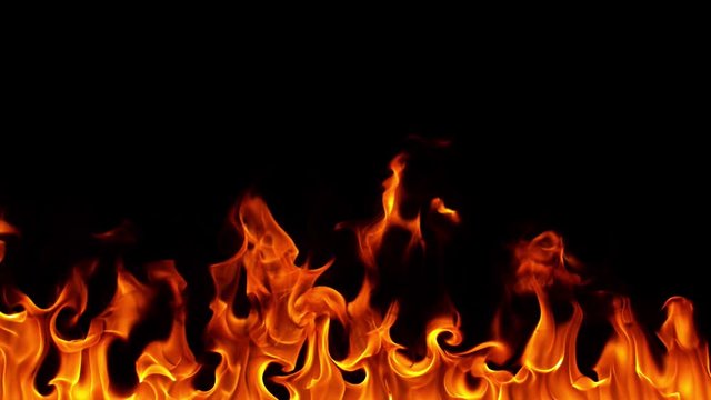 Super slow motion of fire line isolated on black background. Filmed on high speed camera, 1000 fps