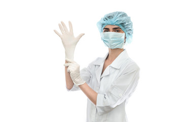 Doctor putting on gloves isolated on white