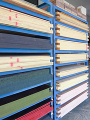 Racks of stacked construction plywood in various thickness and type , wood panels for furniture production on an industrial