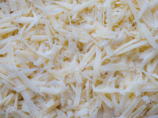 Grated cheese texture background