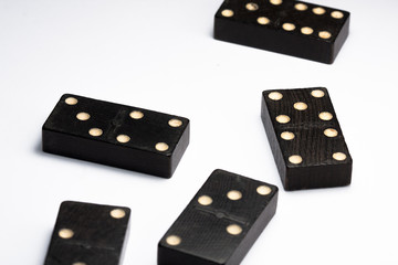 Dominoes standing, in different ways, black.