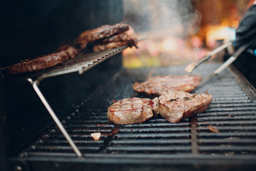 Grilled meat on the grill outdoor