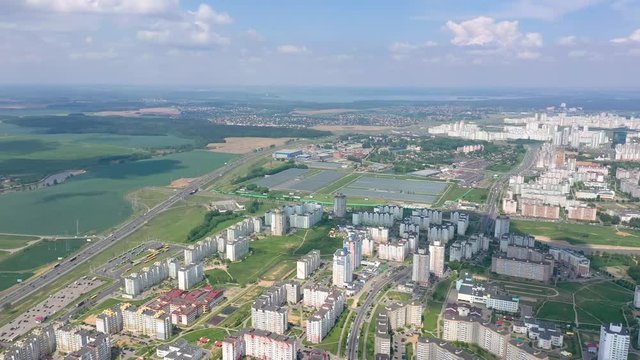 MINSK, BELARUS - MAY, 2019: Aerial drone shot view of city suburbs. Blocks and sleeping quarters from above.