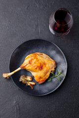 Duck legs confit with mushroom sauce. Top view.