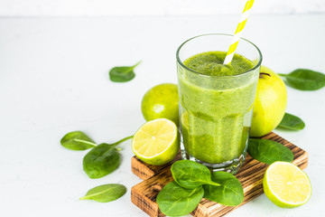Green smoothie on white.