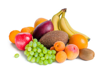 Assortment of fruit bananas, mango, green grapes, apple, coconut, peaches, apricots, tangerines and kiwi are isolated.