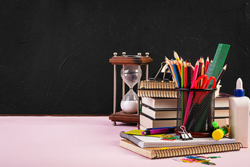 Set of colorful school supplies, books and notebooks. Stationery accessories.