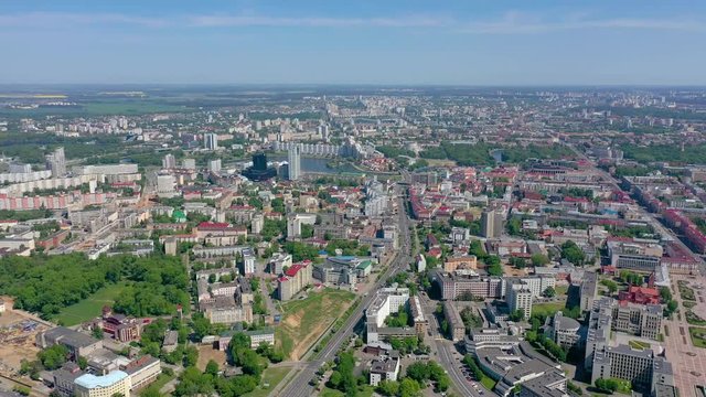MINSK, BELARUS - MAY, 2019: Aerial drone shot view of city centre. Railway station and City Gates from above.