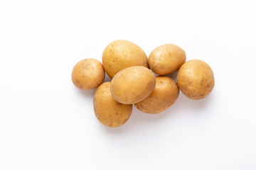 Potatoes isolated on white background. Flat lay. Top view.