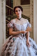 19th century lady in violet crinoline