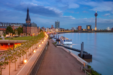 Dusseldorf, Germany. Cityscape image of riverside Düsseldorf, Germany with Rhine river during sunset.