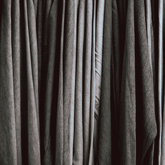 White and black color piece of a cloth Jeans as a background texture pattern.