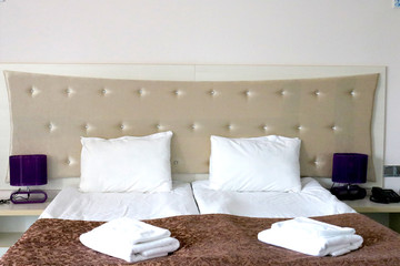 Fototapeta na wymiar A hotel room and comfort bedroom. Hotel room interior