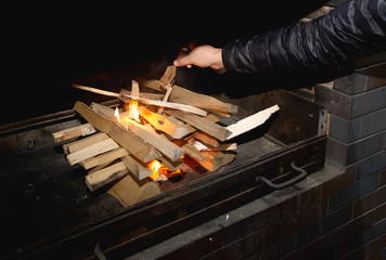 setting fire in a cook stove