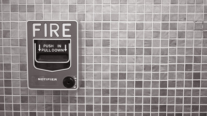 Emergency of Fire alarm or alert or bell warning equipment in red color in the building for safety.