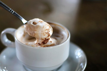 Hot mocha coffee in the morning in a white glass