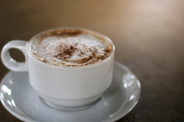 Hot mocha coffee in the morning in a white glass